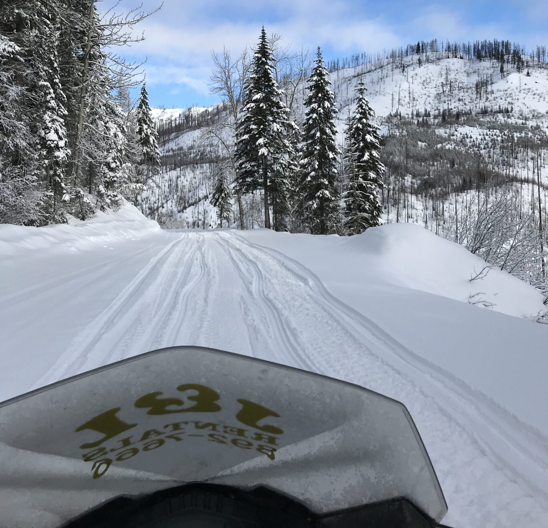 Snowmobiling in whitefish montana